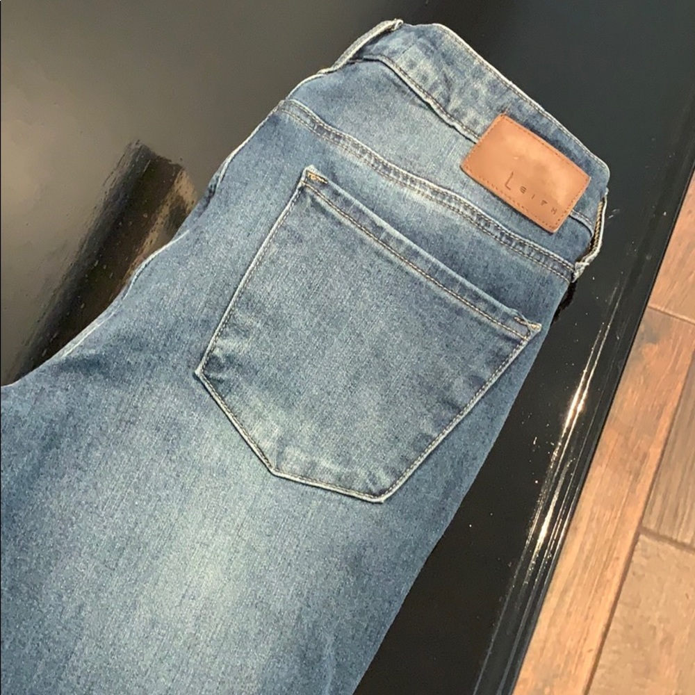 Distressed, medium wash jeans